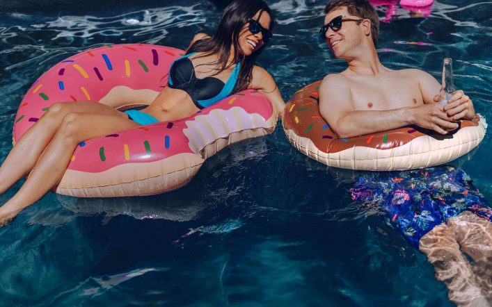 Couple on swimming pool drunked